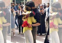 A still from the viral video of two students hugging on the campus of Lahore University | Twitter