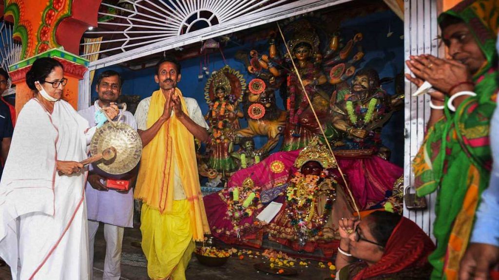 West Bengal CM Mamata Banerjee visits a temple, during an election campaign ahead of state assembly polls, in Nandigram, on 9 March 2021 | PTI