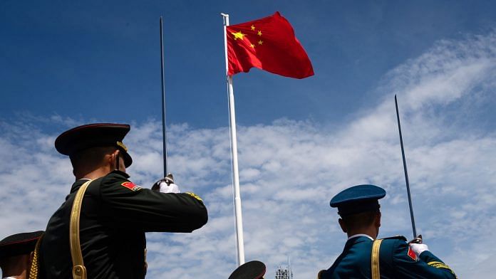 Members of PLA during a flag-raising ceremony | Representational image | Photo: Eduardo Leal | Bloomberg