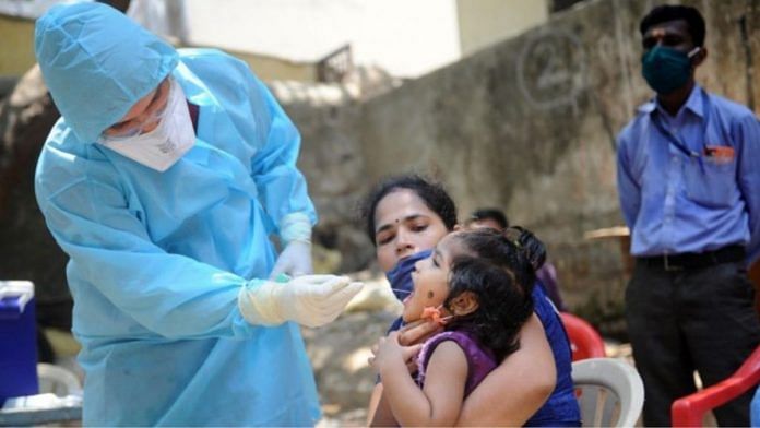 A medic takes a child's swab to test for Covid-19 | Representational image | PTI