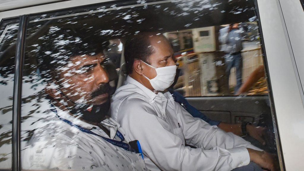 Police officer Sachin Vaze being taken to court by NIA for hearing in Mumbai, on 14 March 2021