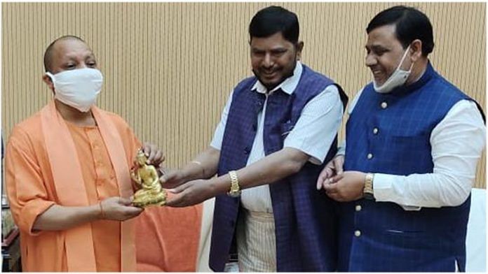 UP Chief Minister Yogi Adityanath (left) with RPI(A) chief Ramdas Athawale (centre) in Lucknow | By special arrangement