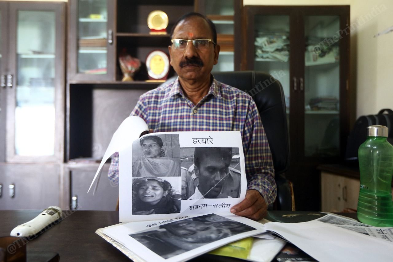 Former Amroha SHO R.P. Gupta, the investigating officer for the case, shows photographs of Shabnam and Saleem | Praveen Jain | ThePrint