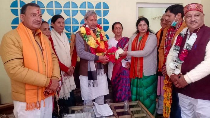 The newly-appointed Uttarakhand Chief Minister Tirath Singh Rawat (centre) | Twitter/Tirath Singh Rawat