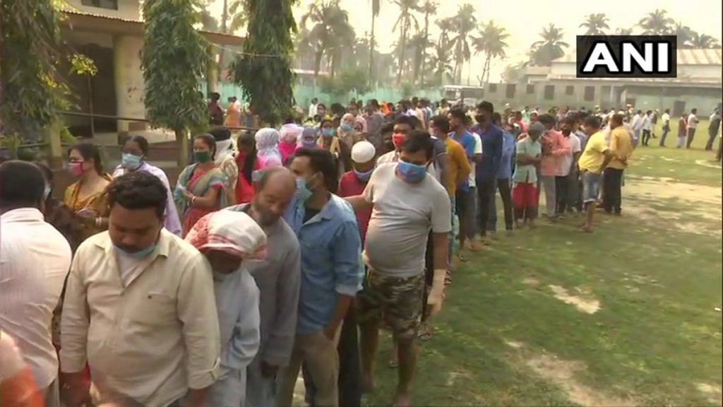 A long queue of voters at a polling centre in Rupahi, Nagaon District in Assam, on 27 March 2021 | Twitter/@ANI