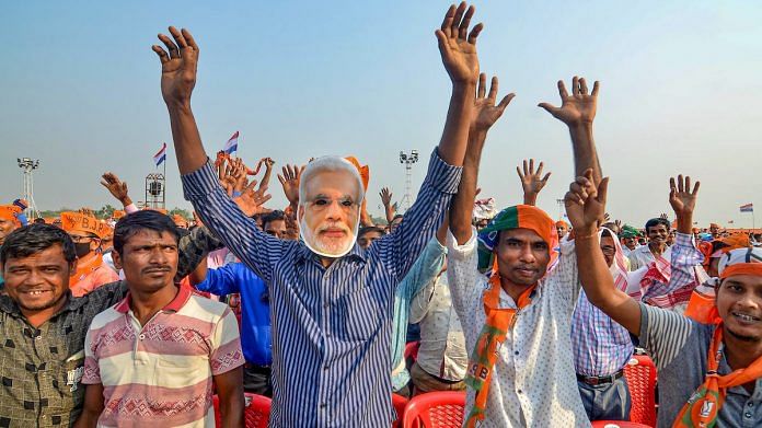 File photo | BJP supporters, many of which are chhutbhaiyya netas, during one of PM Modi's election rally | PTI