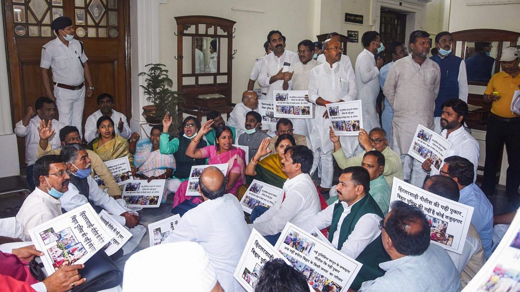 Patna: RJD legislators stage a dharna outside Speaker Vijay Kumar Singh's chamber during Budget Session of Bihar assembly, in Patna, Tuesday, March 23, 2021. | PTI