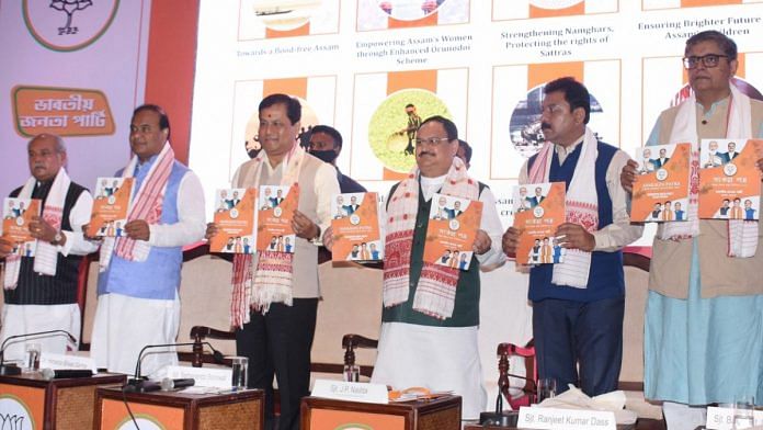 BJP president J.P. Nadda (third from right), Assam CM Sarbananda Sonowal (third from left), state minister Himanta Biswa Sarma (second from left) and other leaders release the party’s assembly polls manifesto in Guwahati Tuesday | PTI