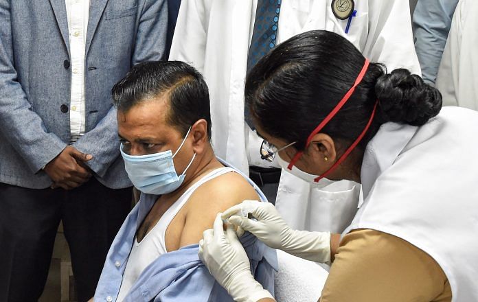 Delhi Chief Minister Arvind Kejriwal gets the first dose of Covid vaccine at LNJP Hospital in New Delhi, on 24 March 2021 | PTI Photo