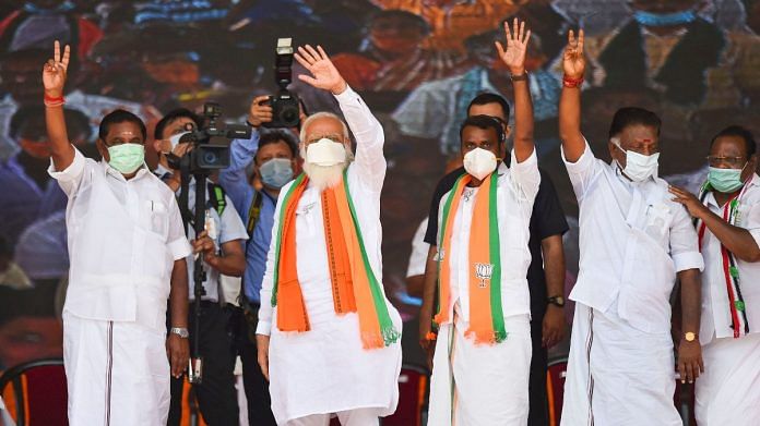 PM Modi during a public meeting in support of their NDA allied candidates ahead of assembly polls at Dharapuram in Tamil Nadu's Tiruppur district, on 30 March 2021 | PTI