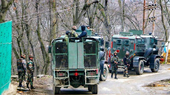Security personnel during an encounter with militants at Khandipora Bjbehara in Anantnag District of South Kashmir, on 11 March 2021 | PTI