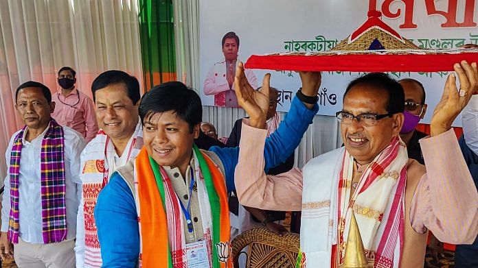 Madhya Pradesh Chief Minister and BJP leader Shivraj Singh Chouhan with Assam CM Sarbananda Sonowal during an election campaign rally at Naharkatia in Dibrugarh district, Monday, March 15, 2021. | PTI