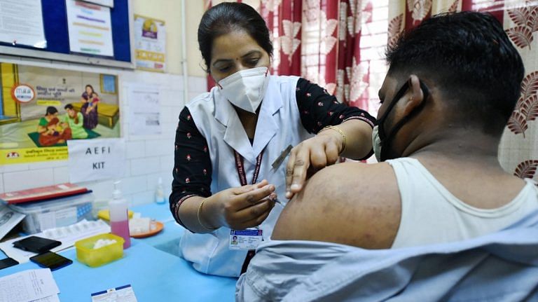 BJP, opposition argue over vaccines on ABP News, Kashi temple history lesson by CNN News 18