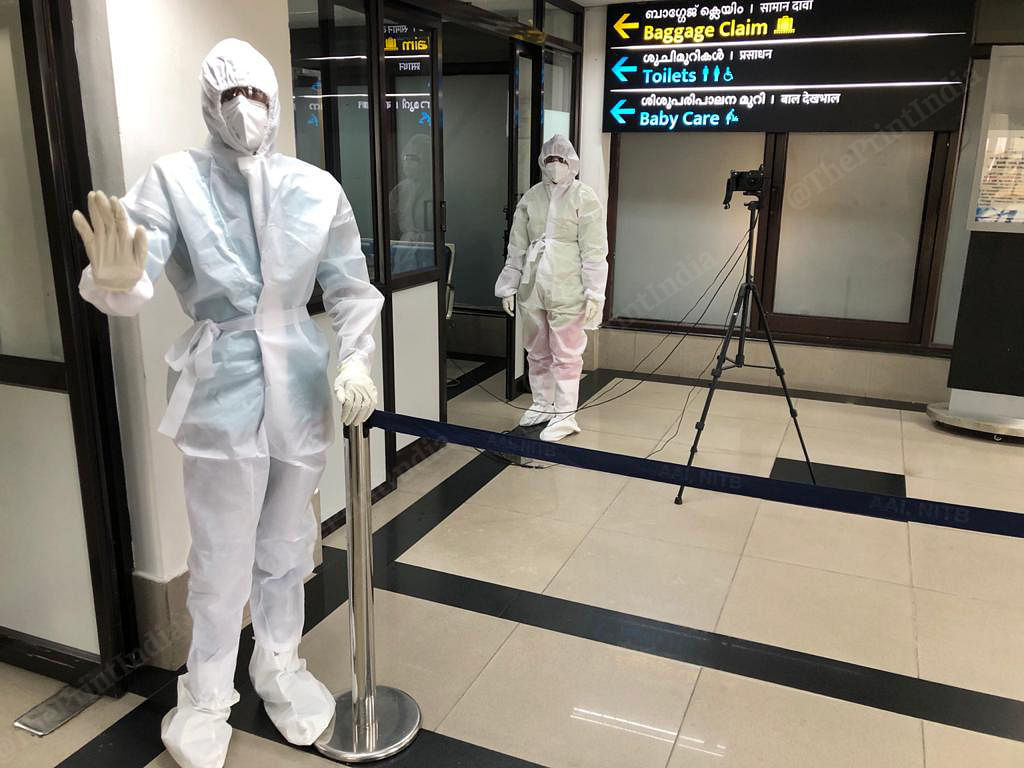 Kerala's health workers in PPE suits welcome you when you land in Thiruvananthapuram airport | Photo: Jyoti Malhotra | ThePrint