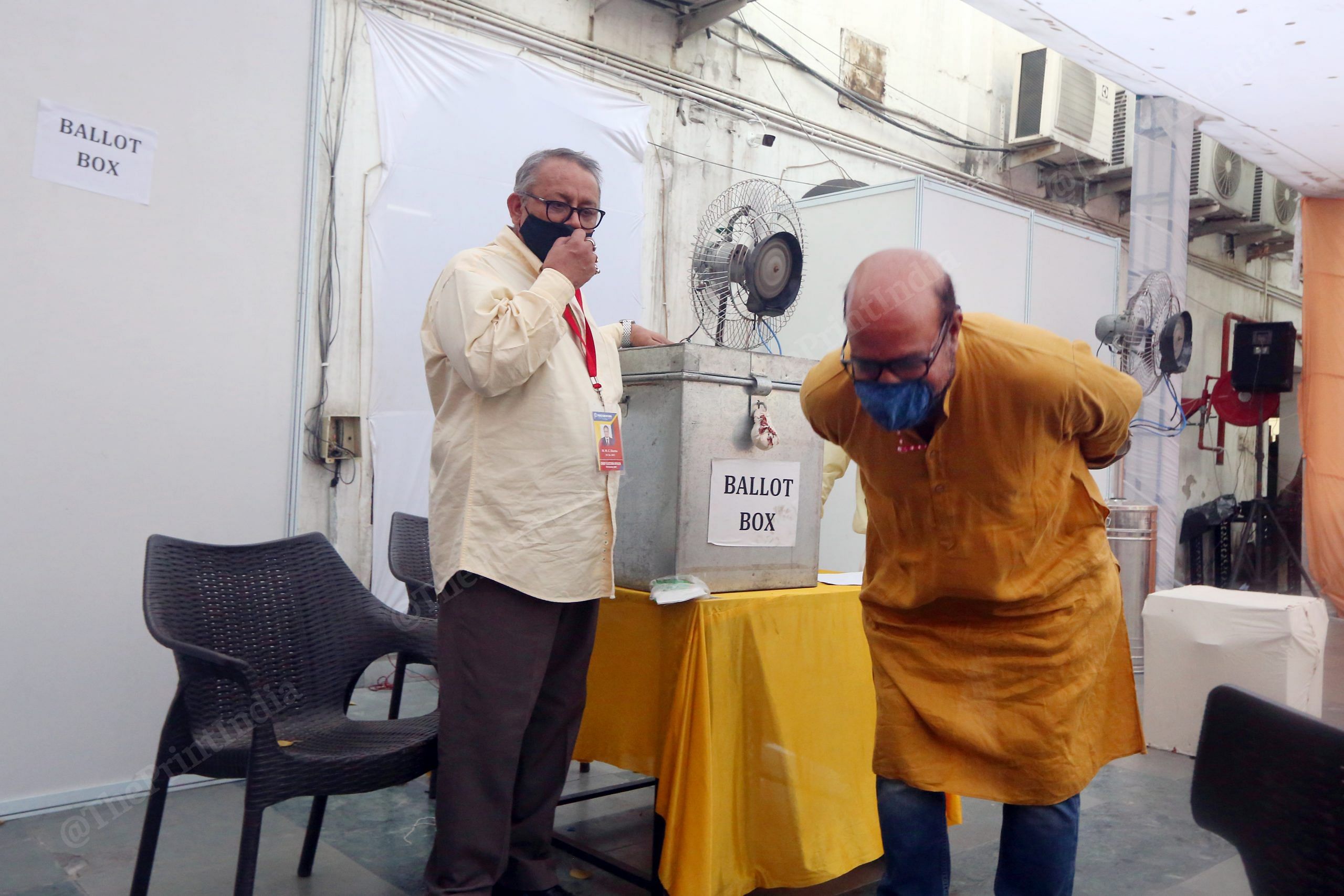 Chief Election Officer M.M.C Sharma (left) and a photojournalist were last ones who casted their vote. | Photo: Praveen Jain | ThePrint
