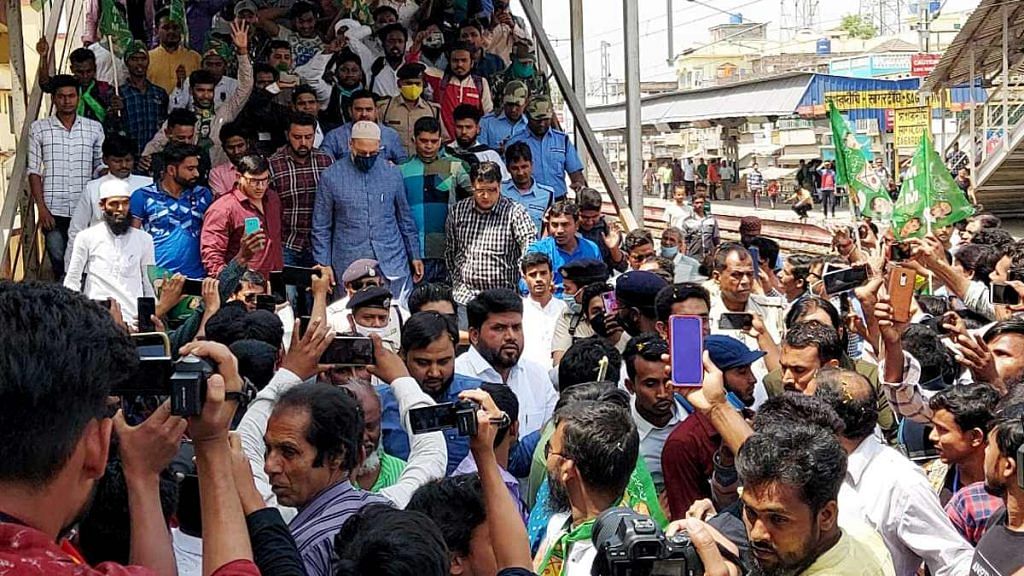 AIMIM chief Asaduddin Owaisi is welcomed by supporters at Sagardighi Railway Station in Murshidabad, in March 2021 | ANI