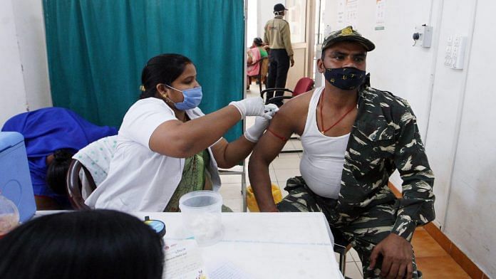 A CRPF trooper is vaccinated in Prayagraj on 6 April 2021 | Representational image | ANI