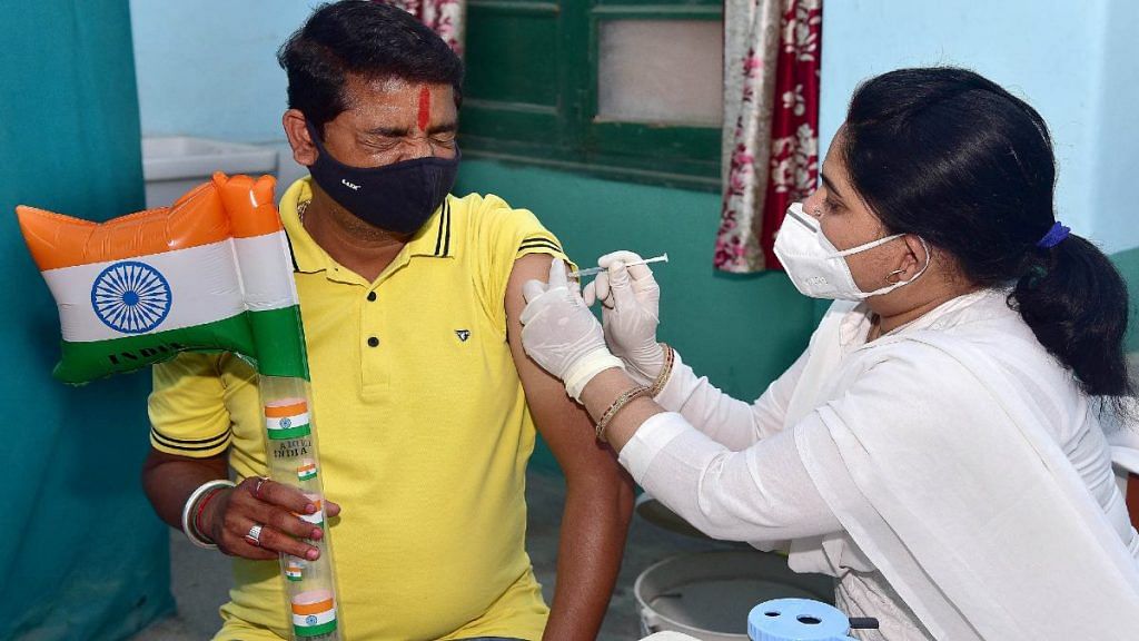 A beneficiary is vaccinated for Covid-19 in Bikaner, Rajasthan | Representational image | ANI