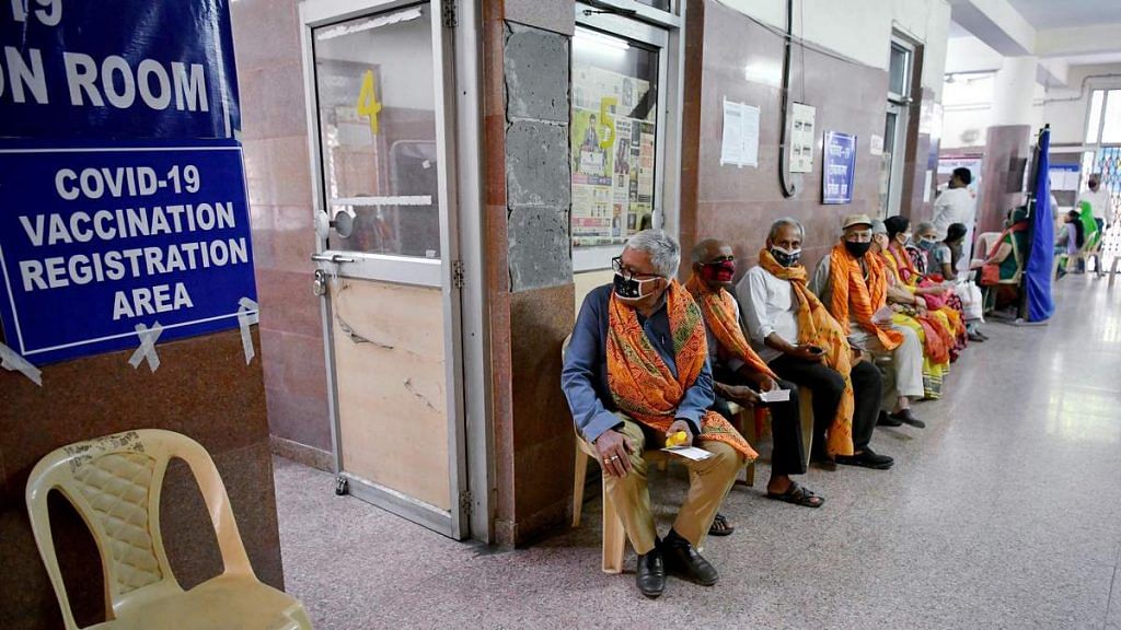 Representational image of people waiting for Covid-19 vaccine registration in New Delhi | Photo: ANI