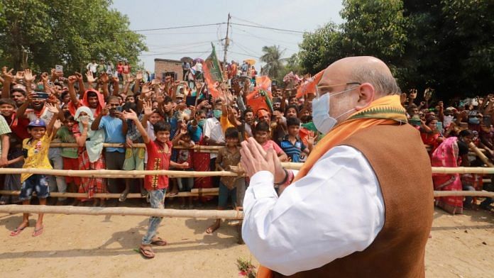 Union Home Minister Amit Shah during a roadshow in Nadia, West Bengal, 11 April 2021| PTI