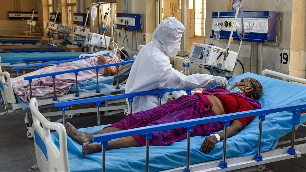 A health worker wearing PPE, attends to Covid-19 patients at a new 100 beds ICU COVID Ward with Oxygen and Ventilator facilities in Hyderabad on April 27, 2021 | PTI
