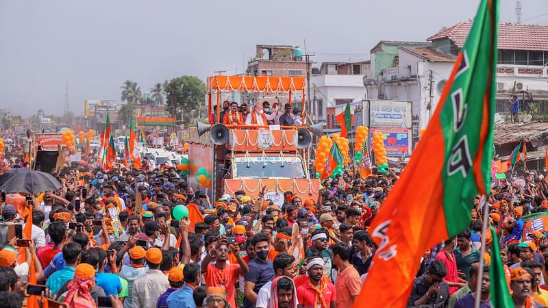 Home Minister Amit Shah during a roadshow at Bethuadahari in West Bengal's Nadia district, on 18 April 2021 | PTI Photo