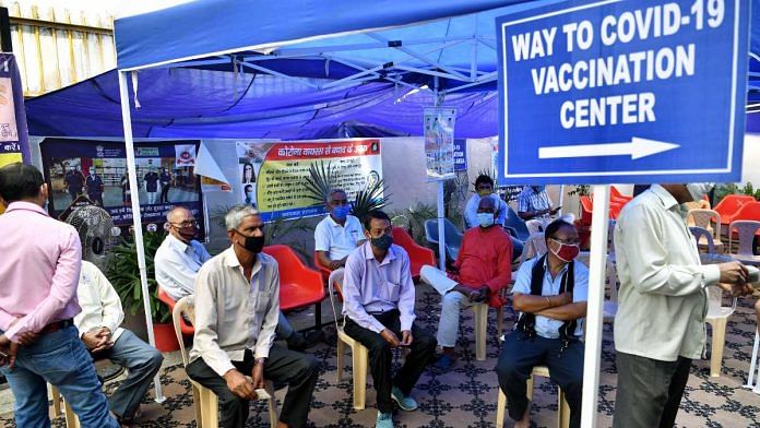Representational image | People wait for their turn to get the first dose of the Covid-19 vaccine | ANI