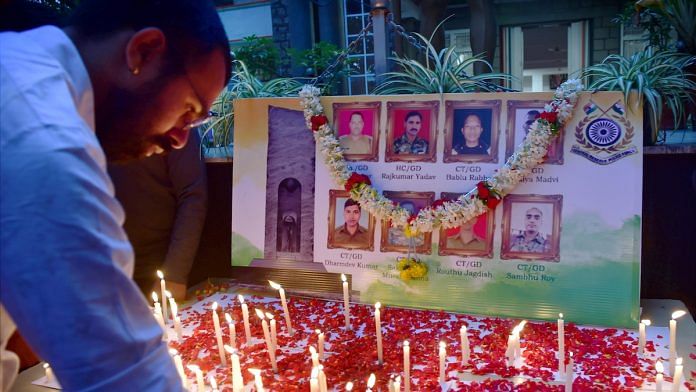 File photo | Students light candles to pay tribute to soldiers, who were killed in the encounter with Naxals in Chhattisgarh | PTI