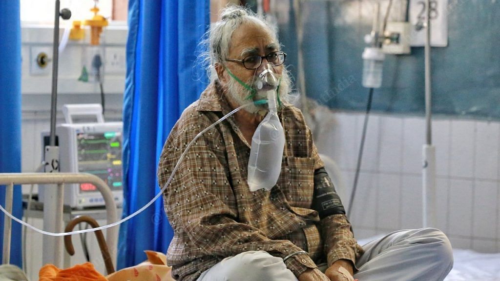 An elderly man on oxygen in a Jalandhar hospital | Photo: Manisha Mondal | ThePrint