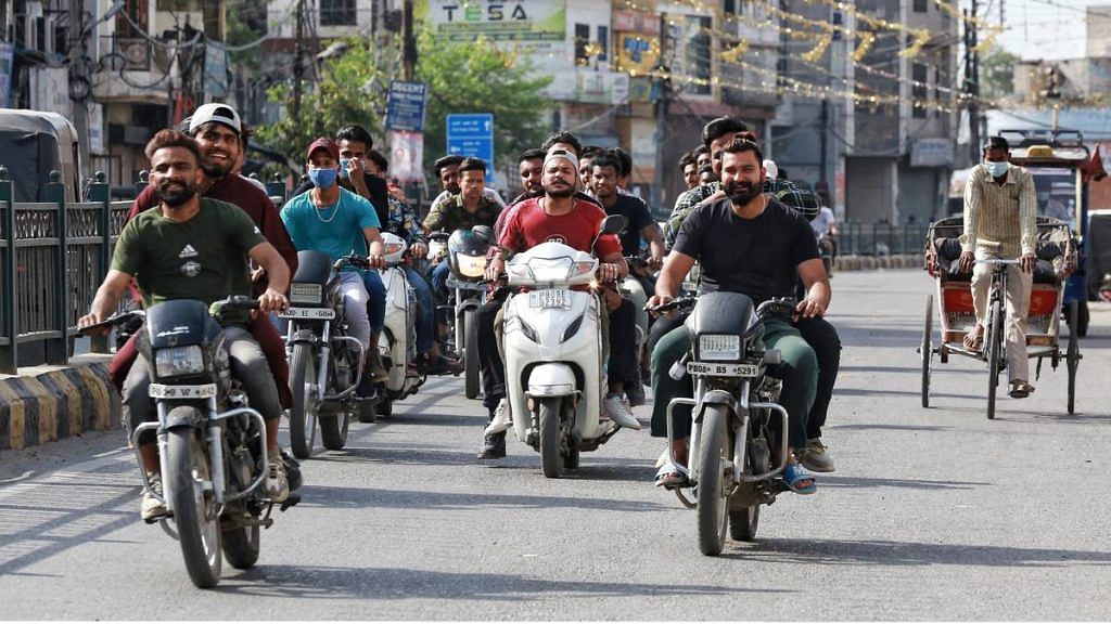 A group of bikers riding without masks in Jalandhar | Photo: Manisha Mondal | ThePrint
