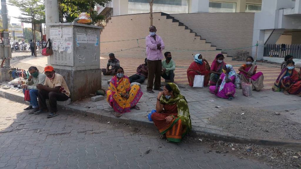 Migrant workers wait for contractors at Ganraj Chowk in Pune | Angana Chakrabarti | ThePrint