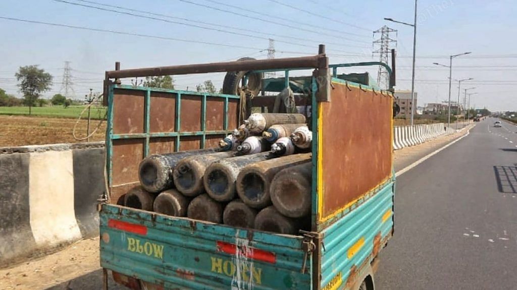 A tempo carries oxygen cylinders on the Ahmedabad-Surat Highway | Representational image | Praveen Jain | ThePrint
