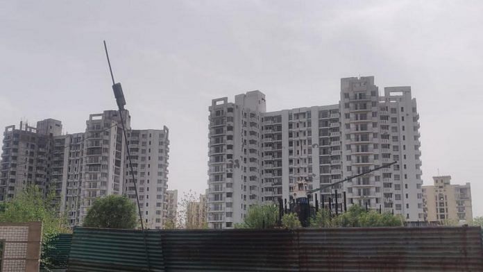 Unfinished towers at Parsvnath Privilege residential complex in Sector Pi, Greater Noida | Photo: Kairvy Grewal/ThePrint