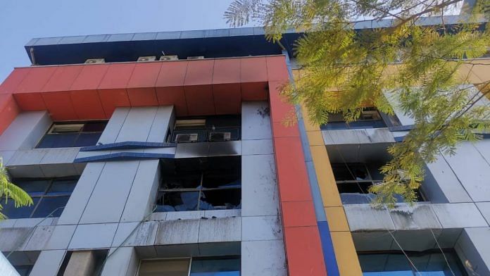 Soot coats the windows of the ICU ward where a fire broke out at Vijay Vallabh Hospital in Virar, Maharashtra | Angana Chakrabarti | ThePrint