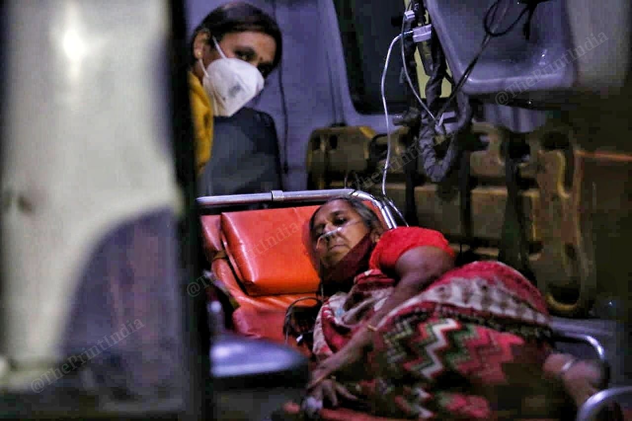 Patients are severe symptoms are inside the ambulances | Photo: Praveen Jain | ThePrint