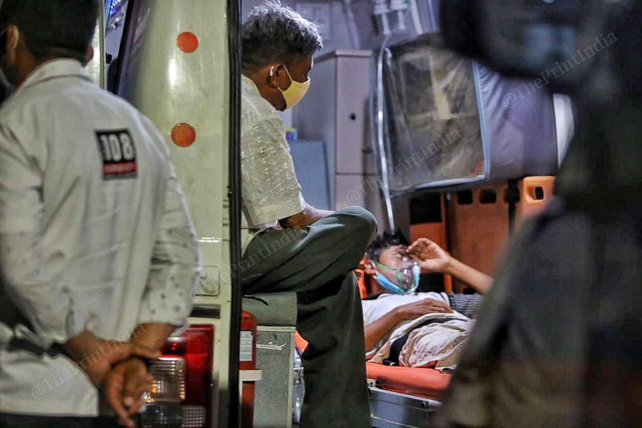 A young man inside an ambulance van | Photo: Praveen Jain | ThePrint