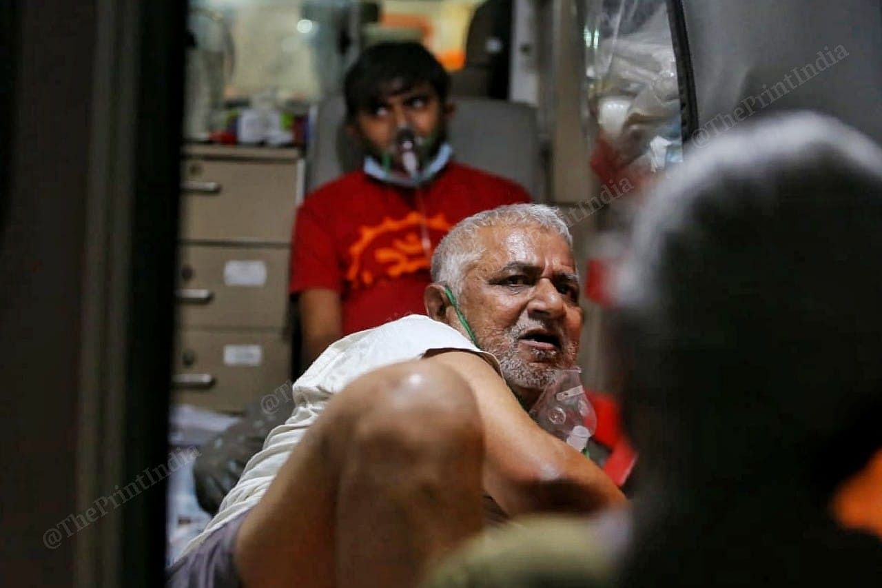 There are several people inside one ambulance | Photo: Praveen Jain | ThePrint