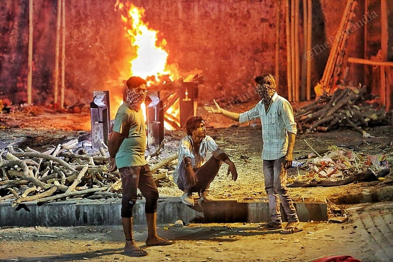 Undertakers of the night shift prepare to start their work, at Juna Vadaj | Photo: Praveen Jain | ThePrint
