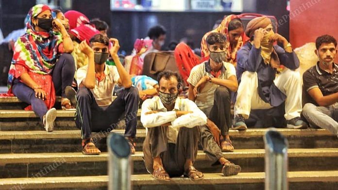 A group of migrant workers from Bihar waits at a railway station | Representational image | Photo: Praveen Jain | ThePrint