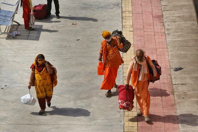 Seers returning from Kumbh at the Sabarmati Railway Station in Ahmedabad Sunday | Praveen Jain | ThePrint