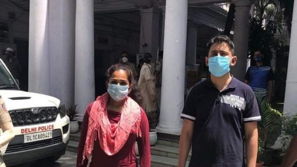The Delhi couple who argued with police over masks Sunday seen at the Daryaganj station Monday | By special arrangement