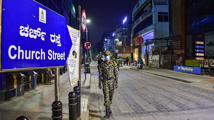 A deserted Church Street after authorities announced night curfew, in Bengaluru on 10 April, 2021 | PTI Photo