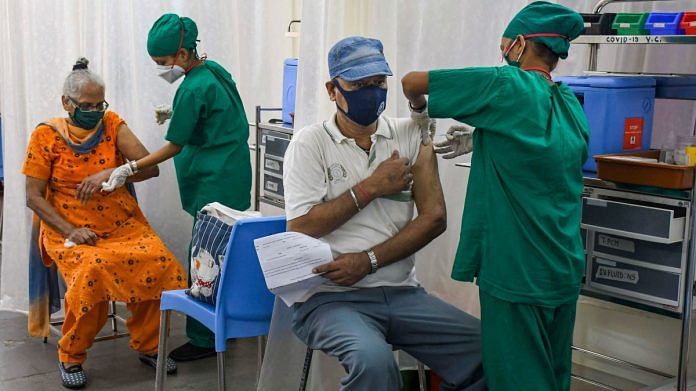A BMC medical staff administers a dose of Covid-19 vaccine to a beneficiary at Nair hospital in Mumbai, on 27 April 2021 | PTI
