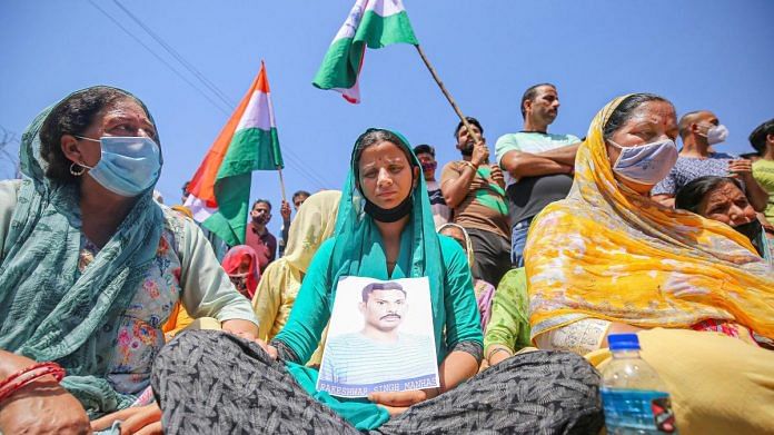 Wife of CRPF Commando Rakeshwar Singh Manhas during a protest, demanding his release from the captivity of Naxals, in Jammu, on 7 April, 2021 | PTI