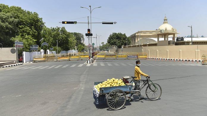 A fruit vendor during lockdown in Lucknow, on 24 April 2021 | PTI Photo