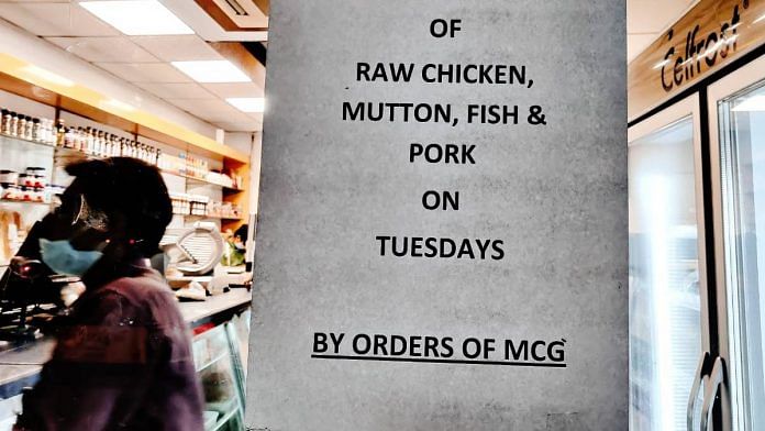 A Green Chick Chop outlet in Gurugram has put up a notice to announce the ban on sale of raw meat on Tuesdays. Photo by Shubhangi Misra. | ThePrint