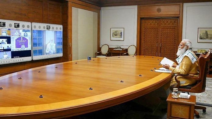 Prime Minister Narendra Modi chairs a COVID-19 review meeting, via video conferencing in New Delhi. | PTI