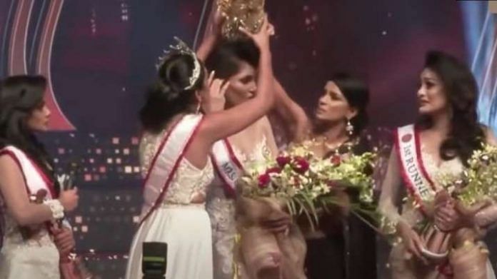 Screengrab of the Mrs World Sri Lanka pageant, where the former Mrs World takes the crown from the winner, Pushpika De Silva, on stage. | YouTube