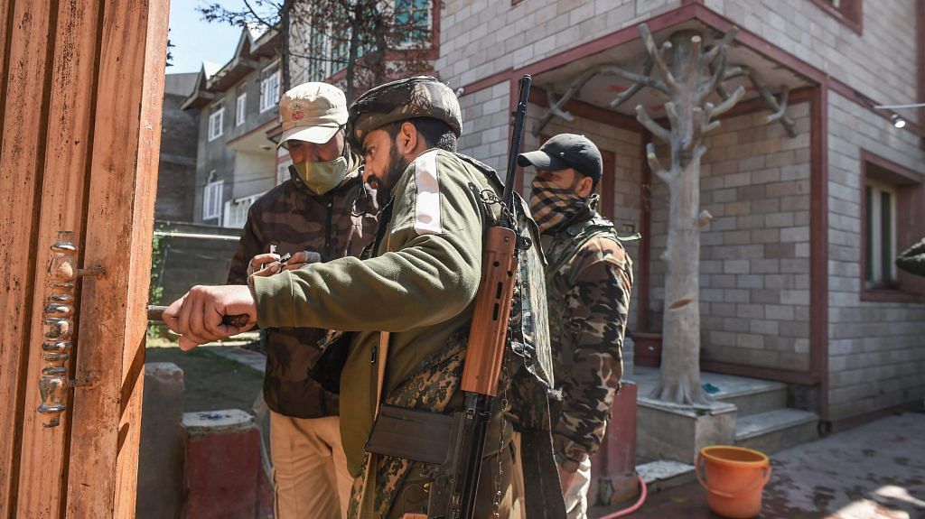 Police personnel examine the scene after the residence of BJP leader Anwar Ahmad Khan was attacked by alleged militants at Near Nowgam, in Srinagar, Thursday, April 1, 2021. | PTI
