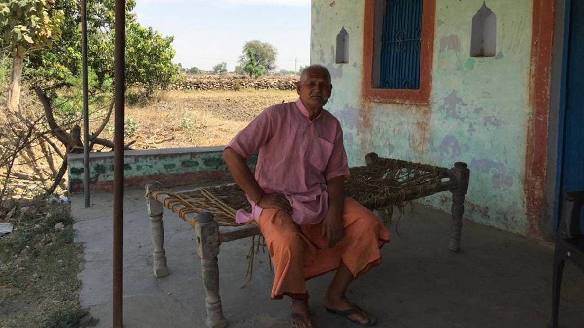 Vansidhar Dwivedi, a retired school principal in Lallapur village, Shankargarh block, says that the villagers fear that if they go to hospital for Covid treatment and die, their families won’t even get the dead bodies | Moushumi Das Gupta | ThePrint